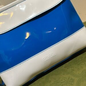 Folli Follie zip wristlet.